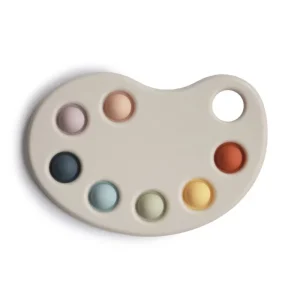 Presse-tout Mushie en forme de palette de peinture